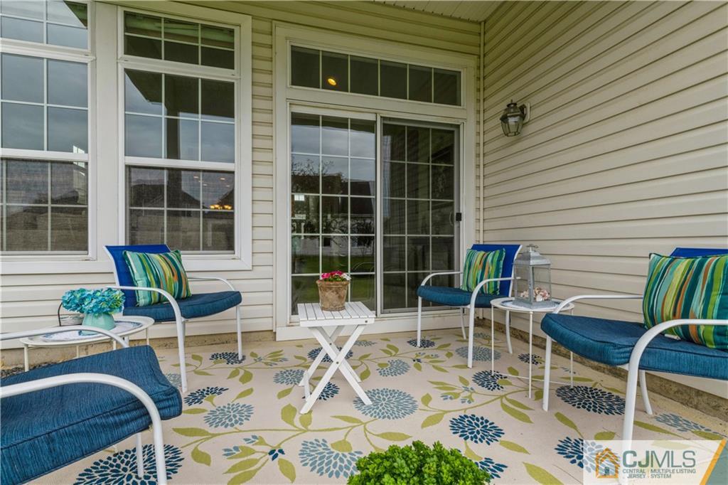 18 Mandrake Road Monroe Township, NJ 08831 - Photo 25 of 44 a view of a chairs and table in a patio