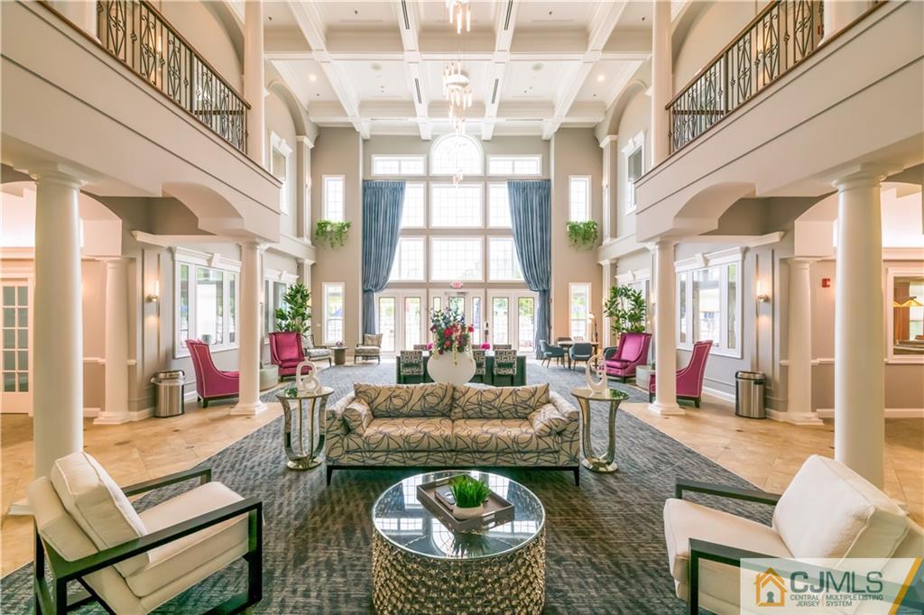 18 Mandrake Road Monroe Township, NJ 08831 - Photo 31 of 44 a living room with fireplace furniture and a large window