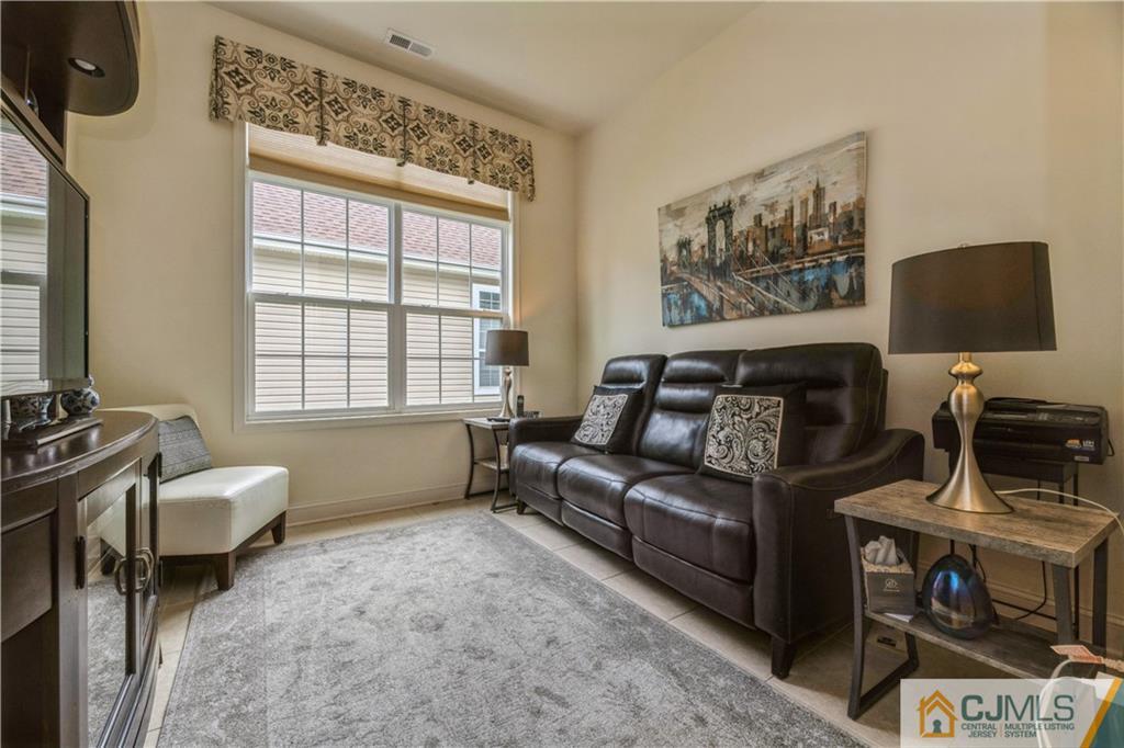 18 Mandrake Road Monroe Township, NJ 08831 - Photo 9 of 44 a bedroom with furniture and a window