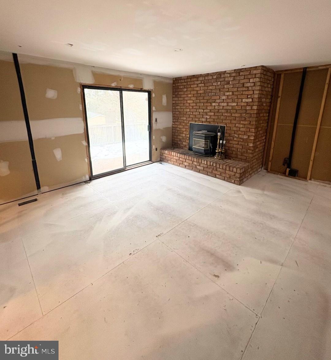 3007 Suffolk Lane Fallston, MD 21047 - Photo 6 of 13 a view of empty room with a fireplace