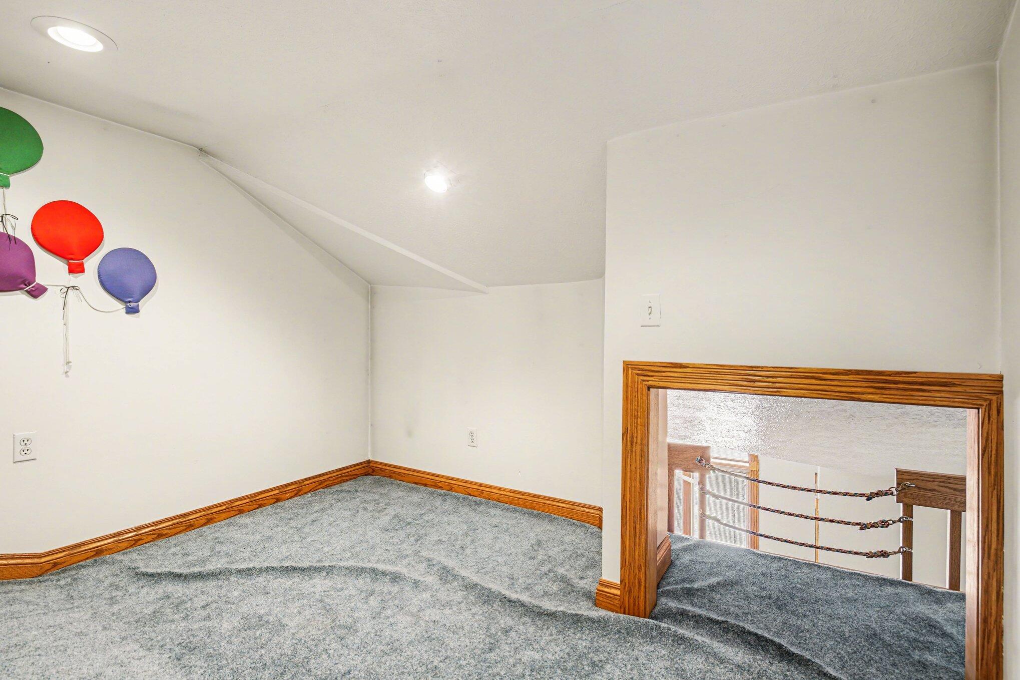 65650 Dailey Road Edwardsburg, MI 49112 - Photo 27 of 59 Loft playroom