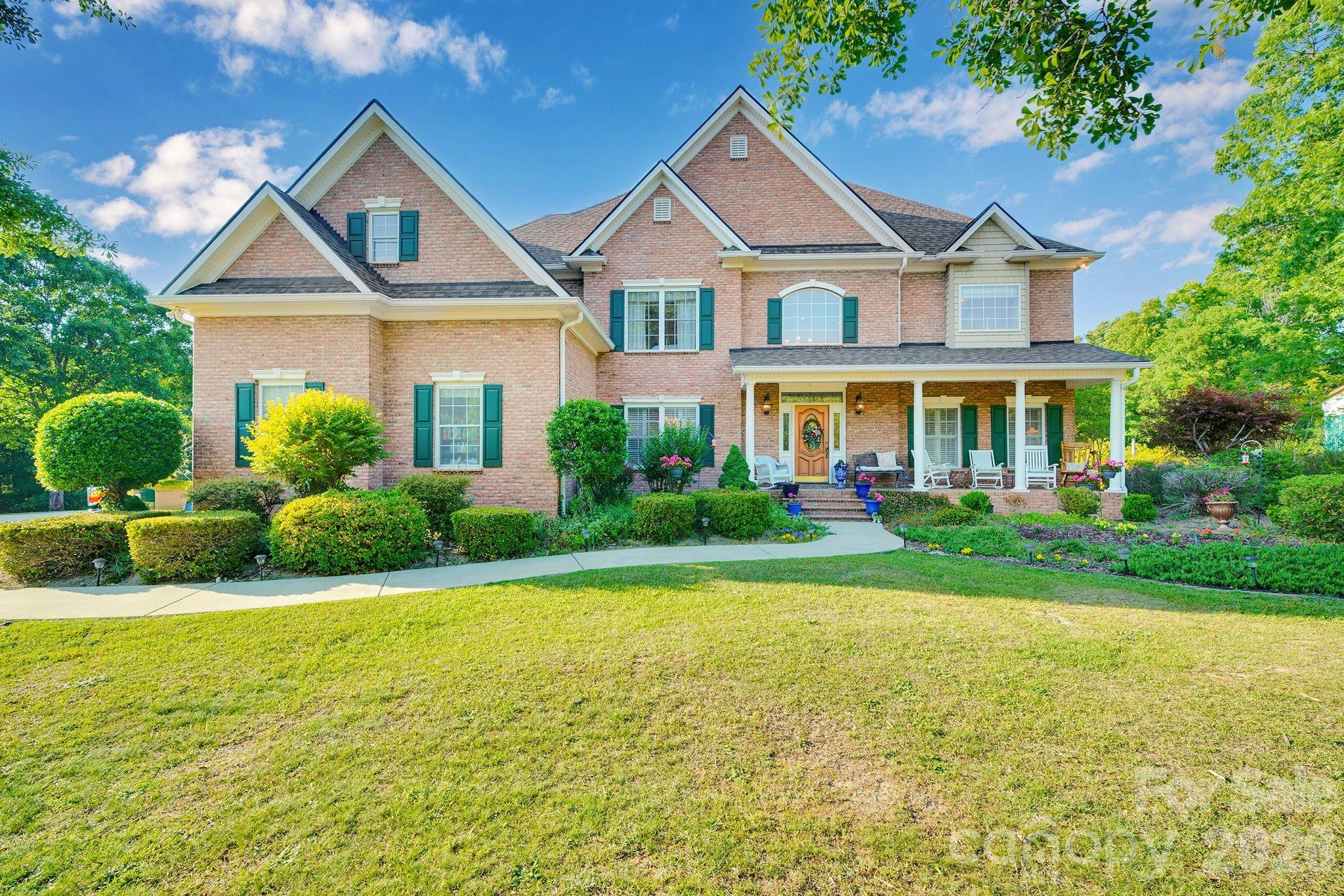 1171 State Rd S-29-376 Lancaster, SC 29720 - Photo 1 of 48 a front view of a house with a yard