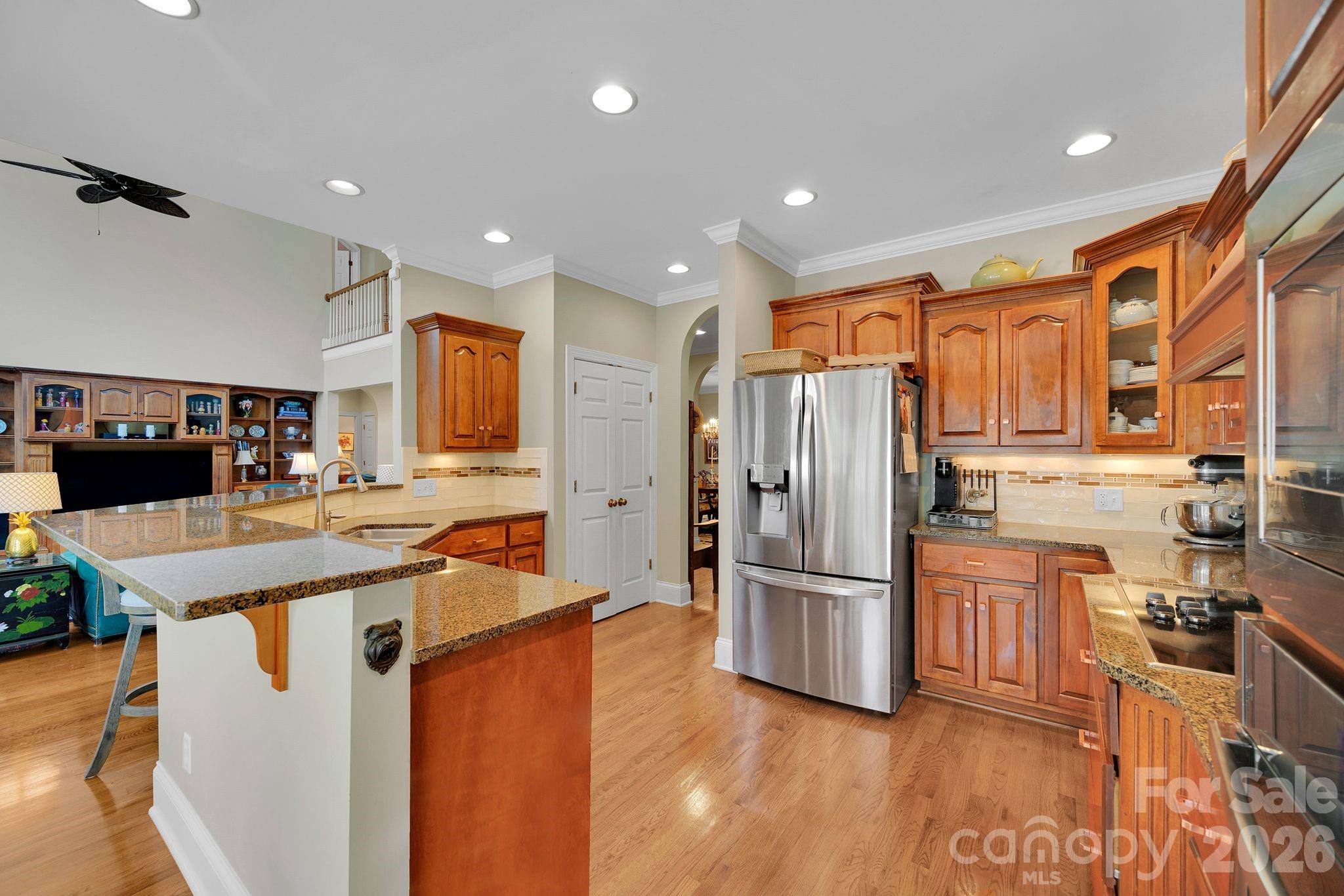 1171 State Rd S-29-376 Lancaster, SC 29720 - Photo 15 of 48 a kitchen with stainless steel appliances granite countertop a refrigerator and a stove top oven