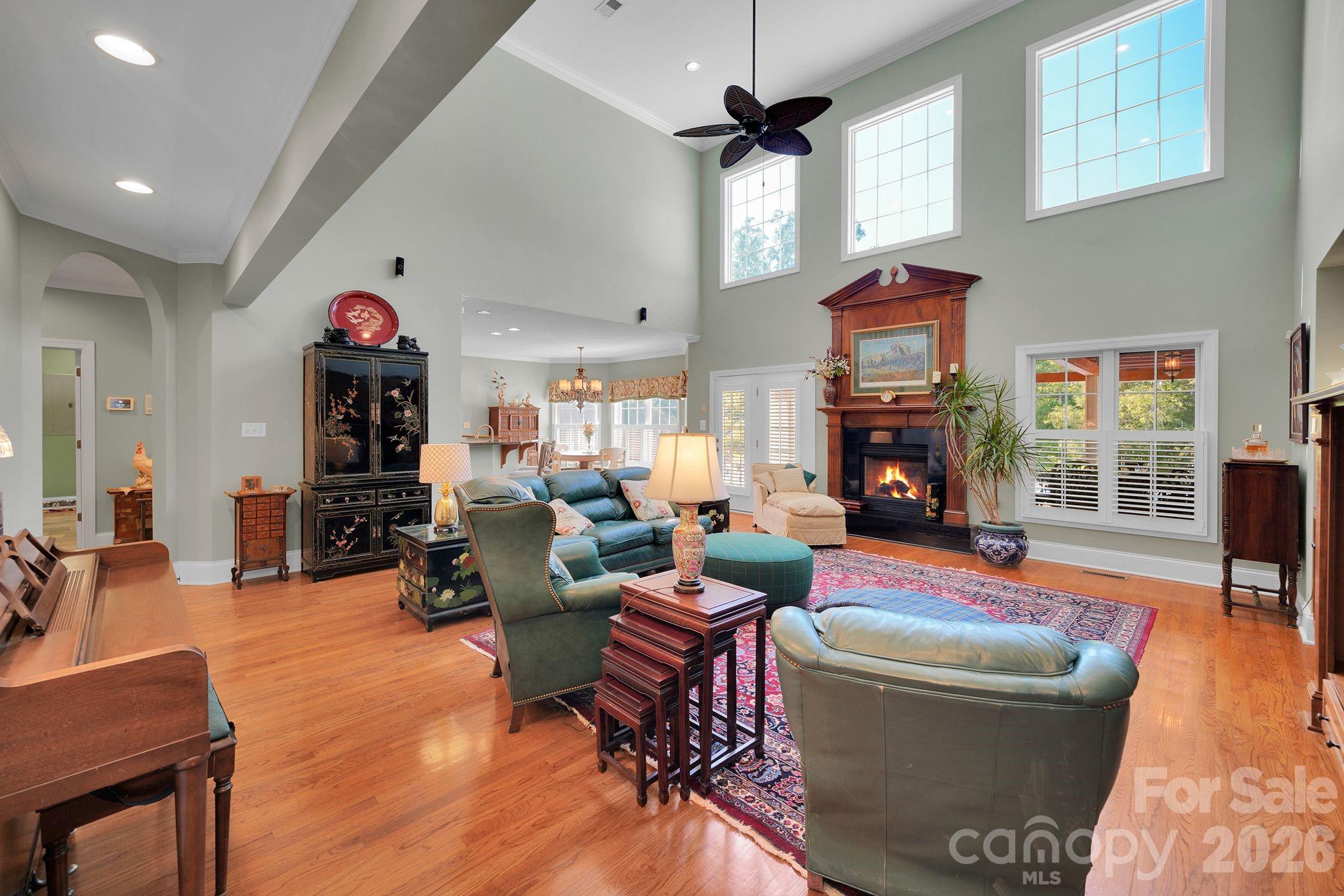 1171 State Rd S-29-376 Lancaster, SC 29720 - Photo 20 of 48 a living room with fireplace furniture and a wooden floor