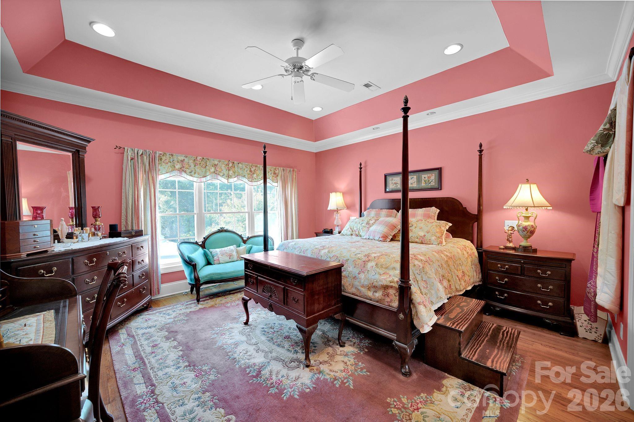 1171 State Rd S-29-376 Lancaster, SC 29720 - Photo 28 of 48 a bed room with a bed and a chandelier