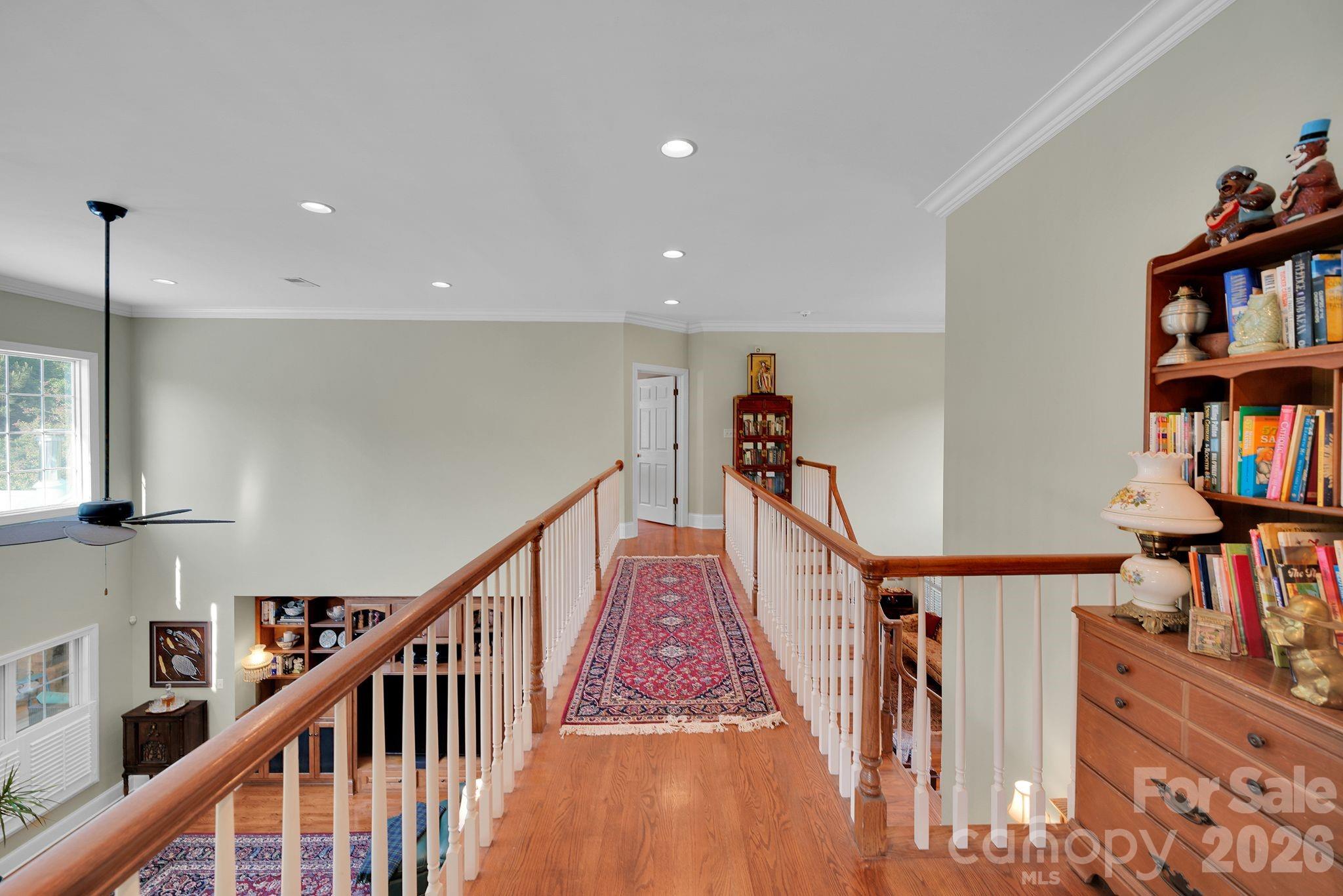 1171 State Rd S-29-376 Lancaster, SC 29720 - Photo 37 of 48 a view of a hallway with wooden furniture and stairs