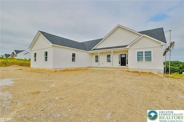 a view of a livingroom with furniture and wooden floor