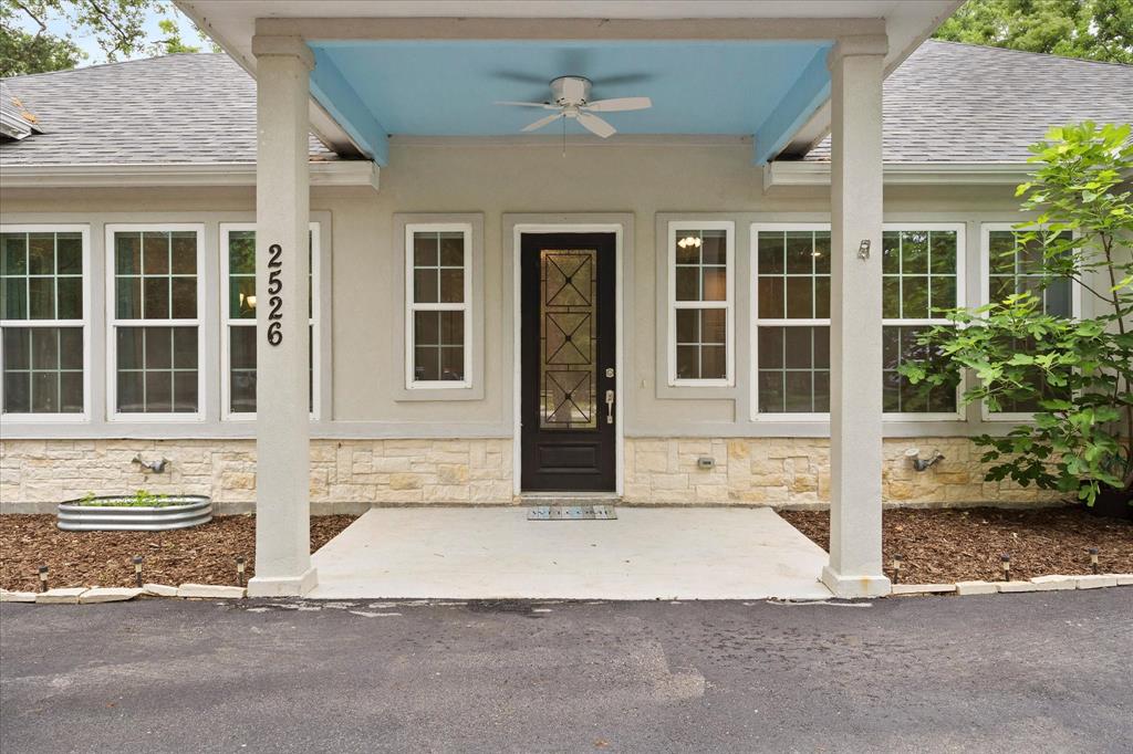 2526 Fox Point Circle Quinlan, TX 75474 - Photo 8 of 35 Inviting covered porch welcomes your arrival!