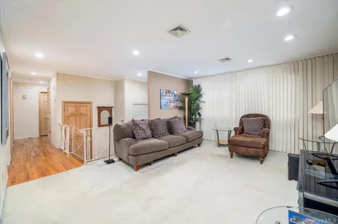 a living room with furniture and a couch