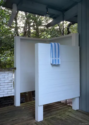 a view of entryway with wooden floor