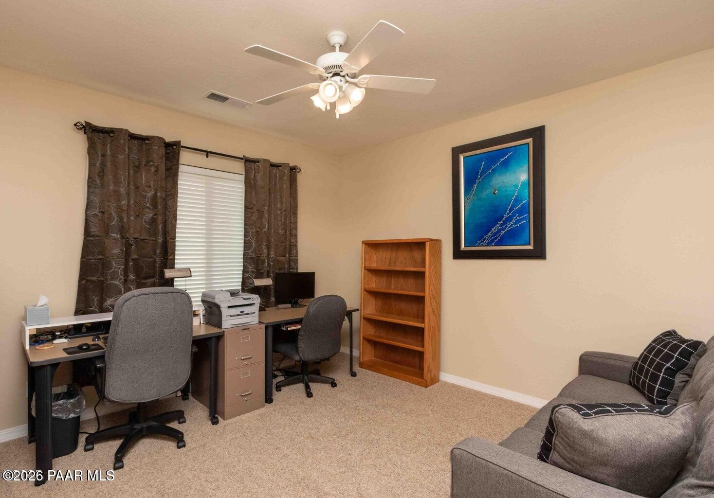 12933 Ponce Street Dewey, AZ 86327 - Photo 19 of 41 a view of a livingroom with workspace and a couch