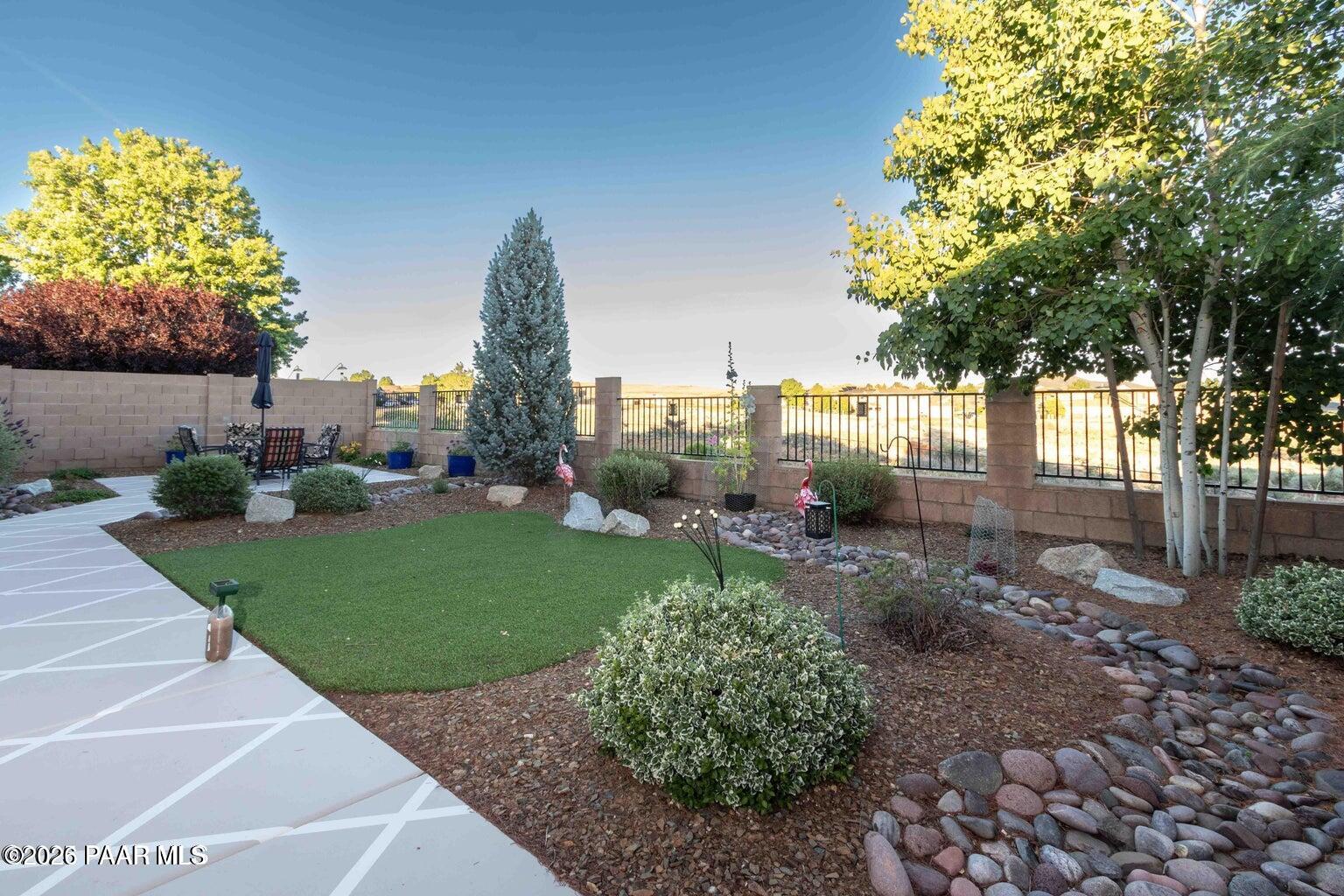 12933 Ponce Street Dewey, AZ 86327 - Photo 23 of 41 a view of a garden with a fountain