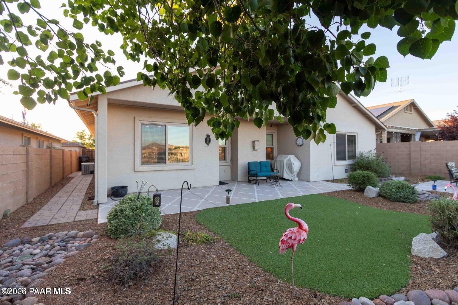 12933 Ponce Street Dewey, AZ 86327 - Photo 26 of 41 a front view of a house with garden