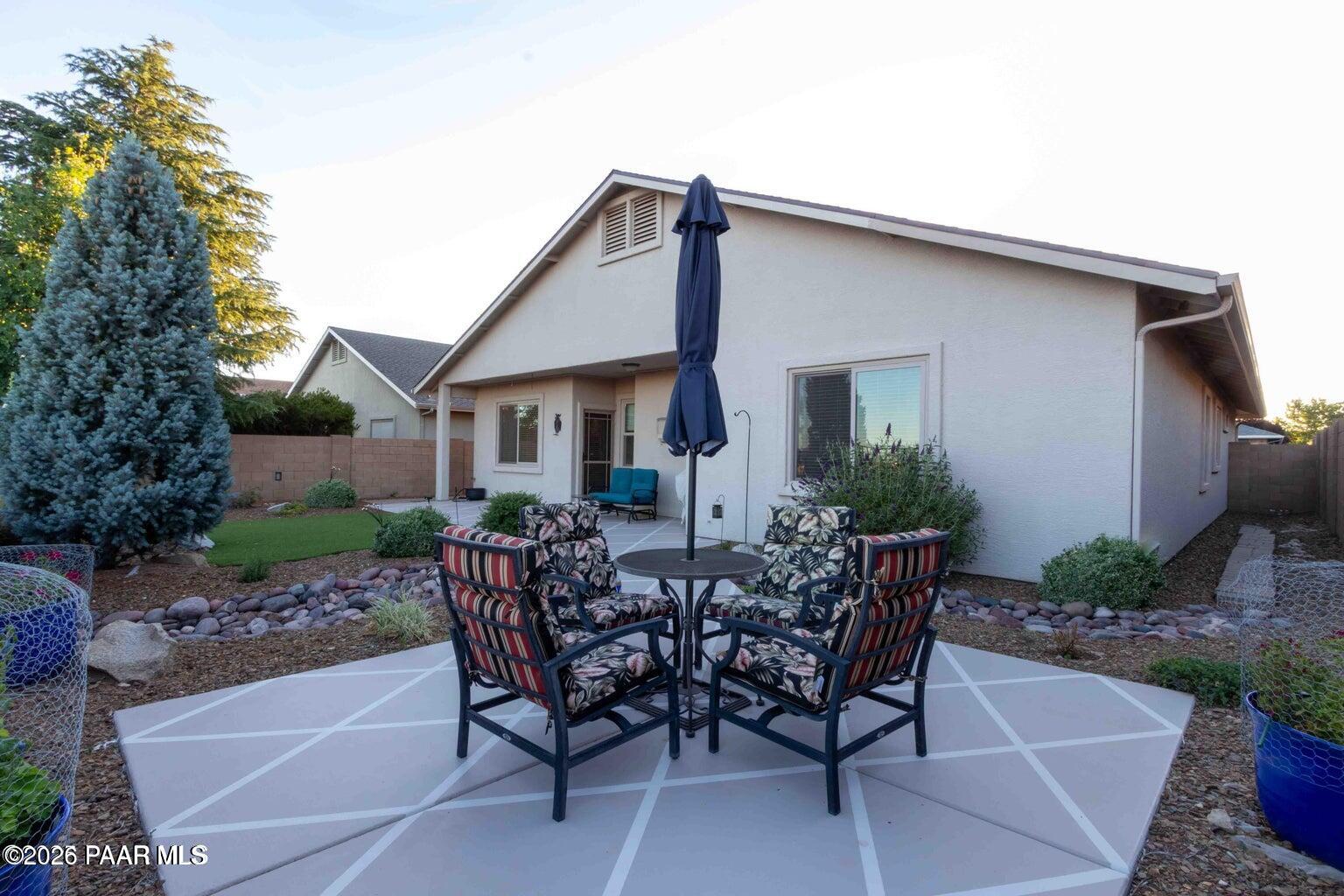 12933 Ponce Street Dewey, AZ 86327 - Photo 27 of 41 a view of a house with backyard and sitting area