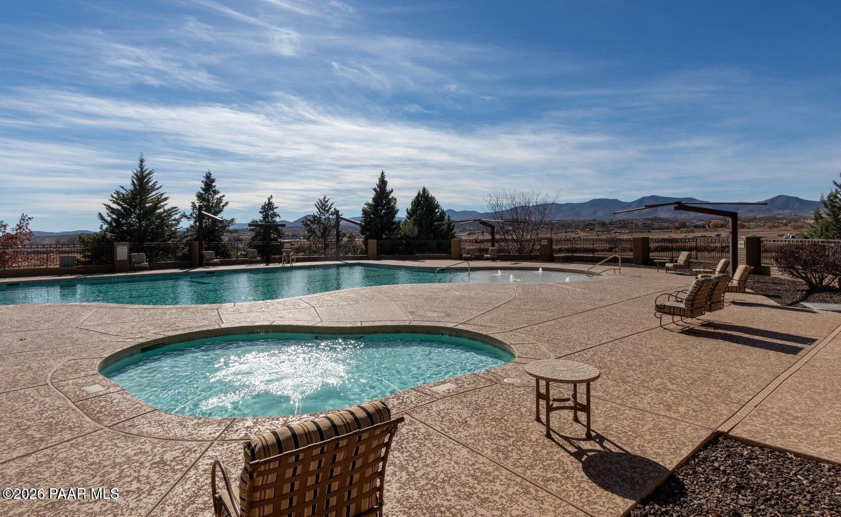 12933 Ponce Street Dewey, AZ 86327 - Photo 36 of 41 a view of a swimming pool with a lake view