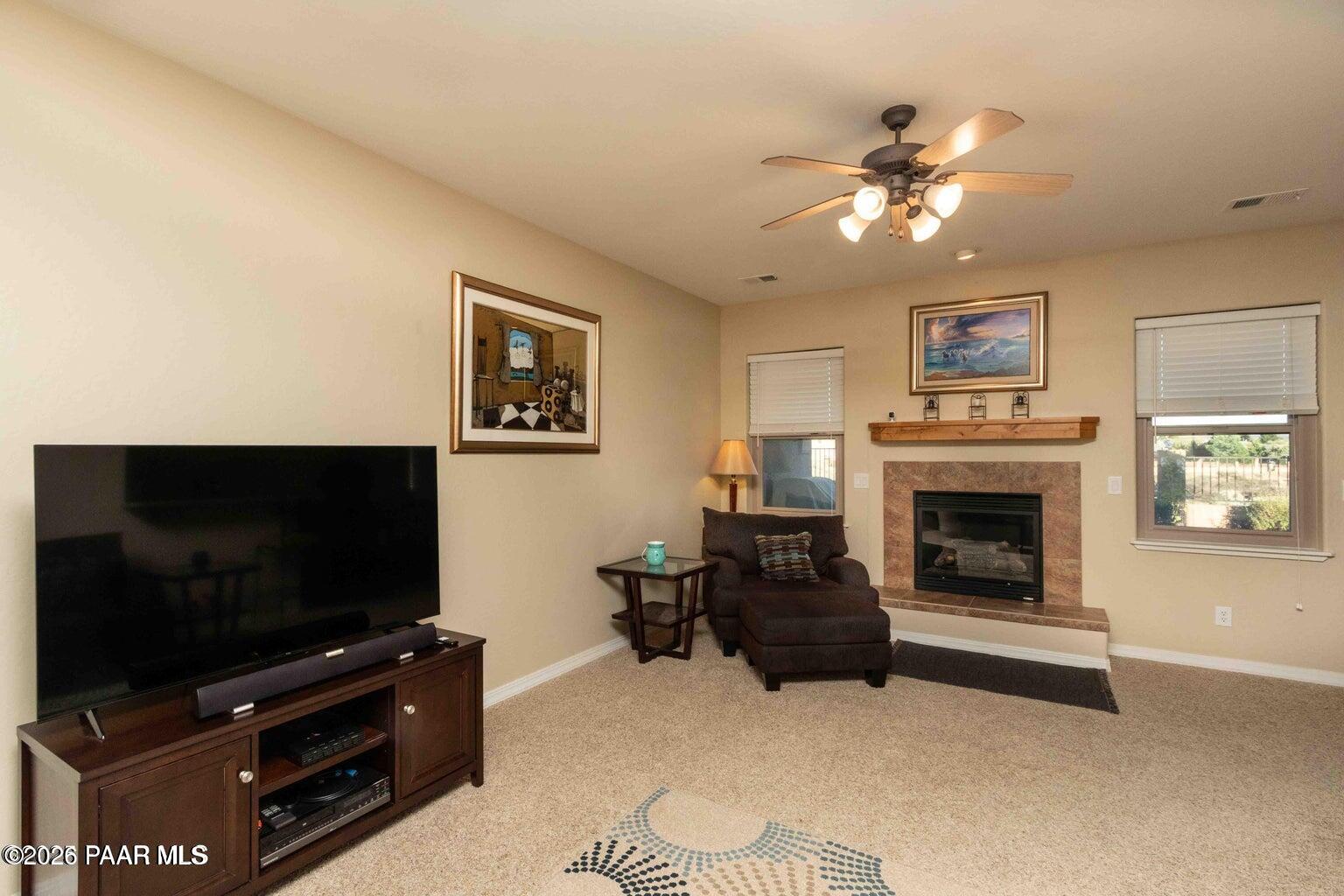12933 Ponce Street Dewey, AZ 86327 - Photo 7 of 41 a living room with furniture and a flat screen tv