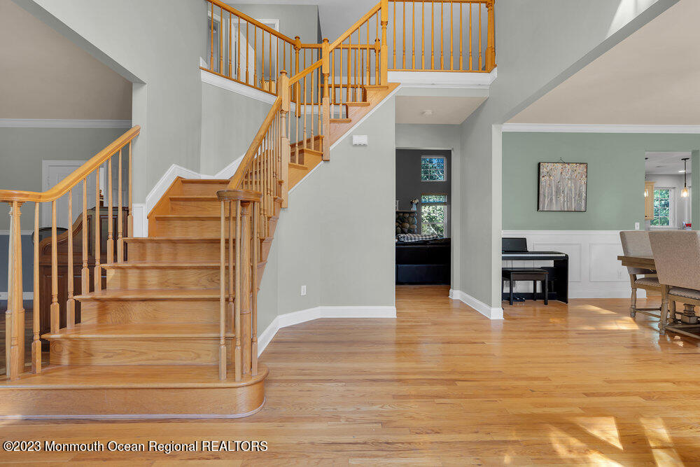 30 Erin Drive Jackson, NJ 08527 - Photo 15 of 105 a view of entryway livingroom and hall with wooden floor