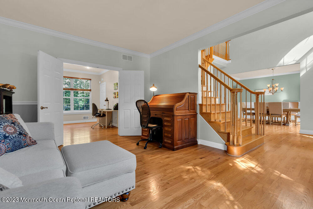 30 Erin Drive Jackson, NJ 08527 - Photo 19 of 105 a living room with furniture gym equipment and a window