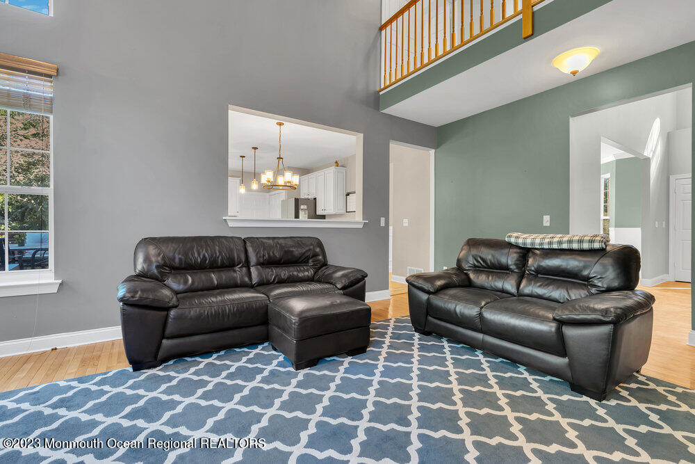 30 Erin Drive Jackson, NJ 08527 - Photo 27 of 105 a living room with furniture and a rug