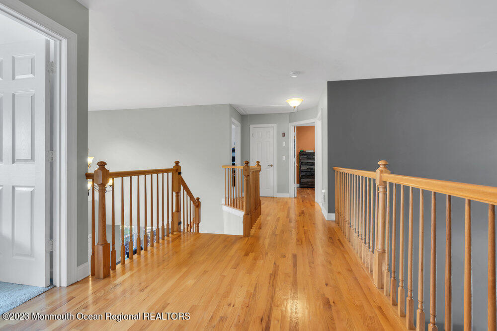 30 Erin Drive Jackson, NJ 08527 - Photo 40 of 105 a view of a hallway with wooden floor