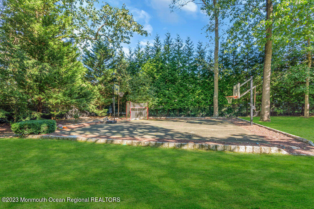 30 Erin Drive Jackson, NJ 08527 - Photo 62 of 105 a view of a yard with a tree