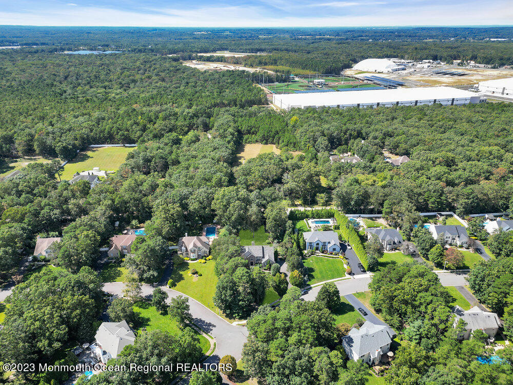 30 Erin Drive Jackson, NJ 08527 - Photo 76 of 105 an aerial view of residential houses with outdoor space and trees