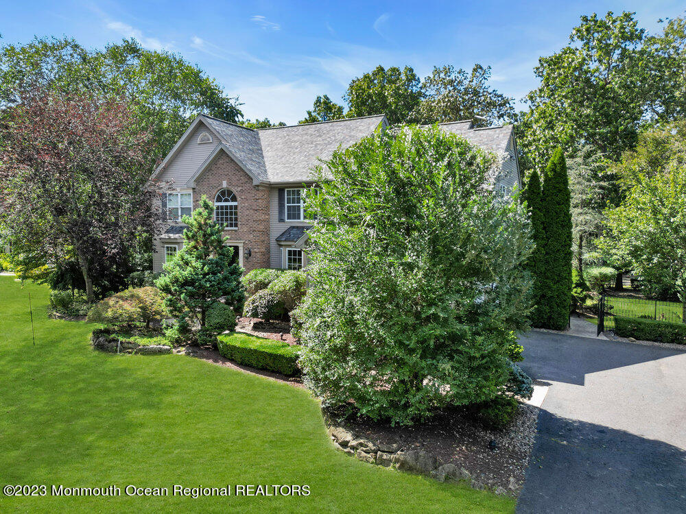 30 Erin Drive Jackson, NJ 08527 - Photo 8 of 105 a front view of a house with a yard