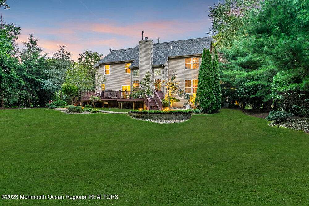 30 Erin Drive Jackson, NJ 08527 - Photo 88 of 105 a view of a house with a big yard and potted plants