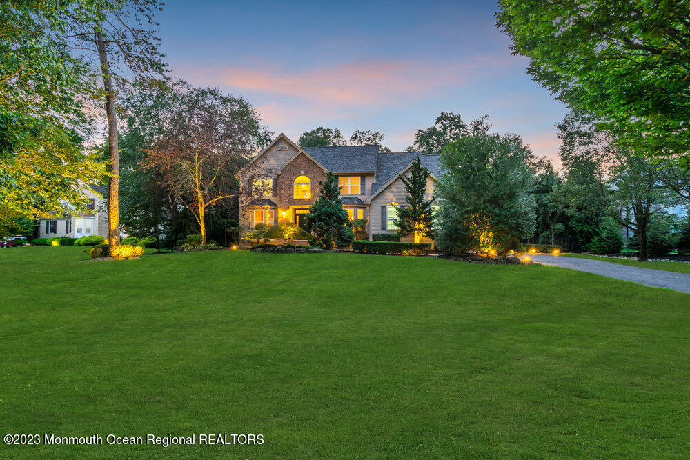 30 Erin Drive Jackson, NJ 08527 - Photo 98 of 105 a front view of a house with a big yard