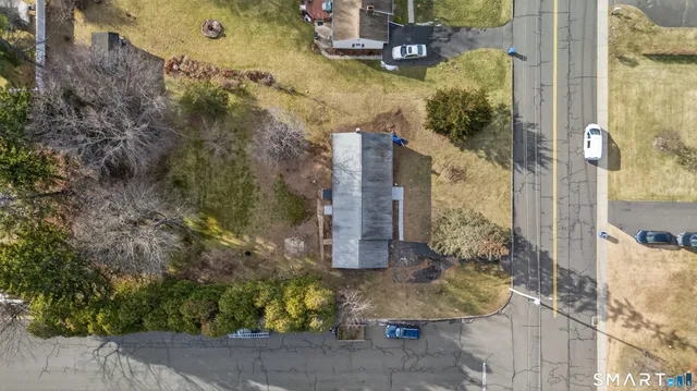 a bird view of water house with outdoor space