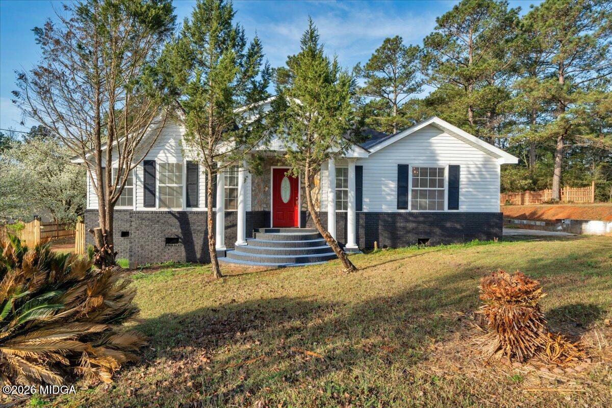 a view of a house with a patio