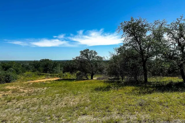 a view of a lake with a big yard