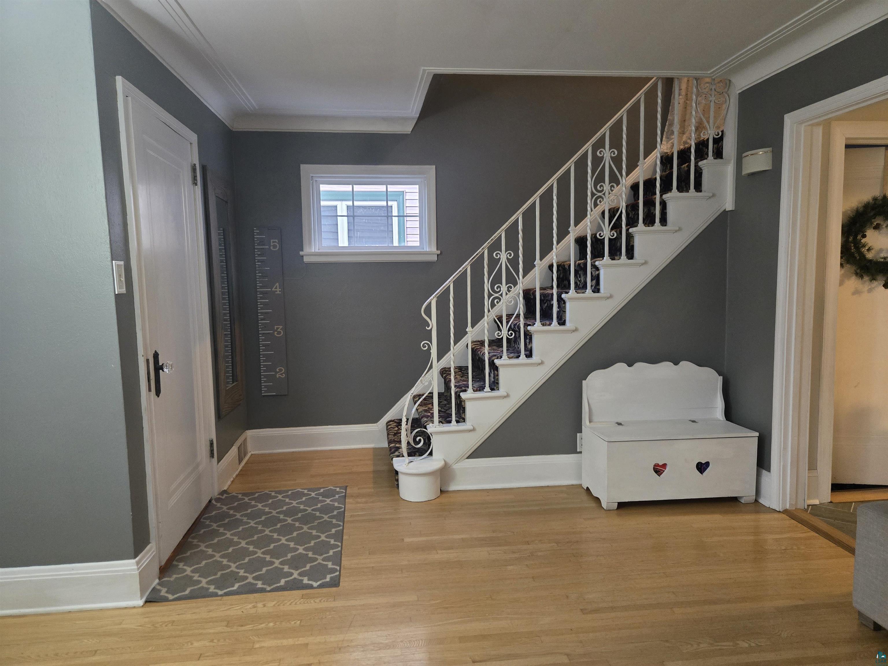 4327 West 5th Street Duluth, MN 55807 - Photo 7 of 25 Foyer featuring ornamental molding and light wood-type flooring