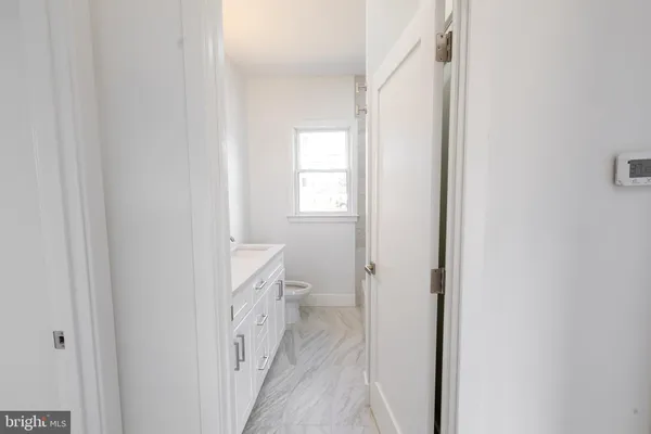 a bathroom with a sink and a toilet