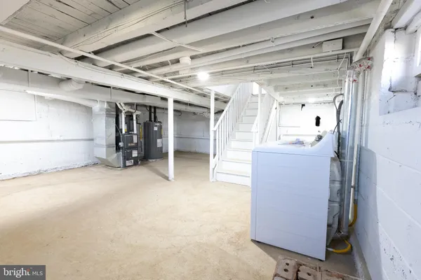 a view of balcony with wooden floor and fence