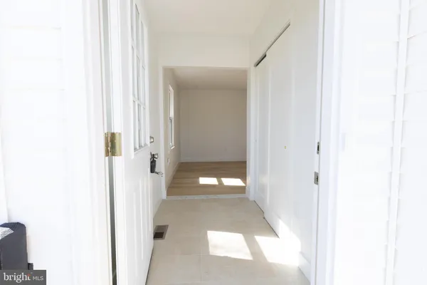 a view of gallery with door