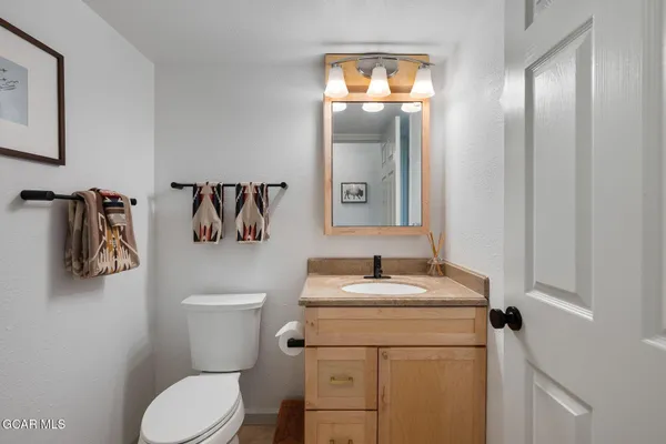 a bedroom with a bed and closet