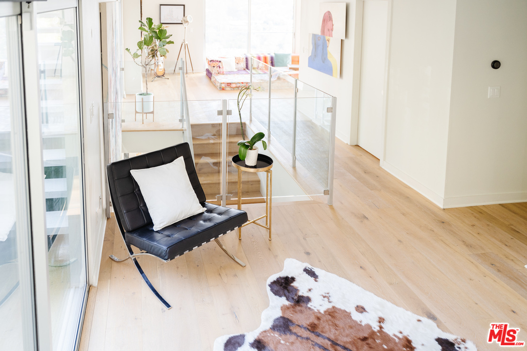9318 Warbler Way Los Angeles, CA 90069 - Photo 23 of 46 a living room with a couch