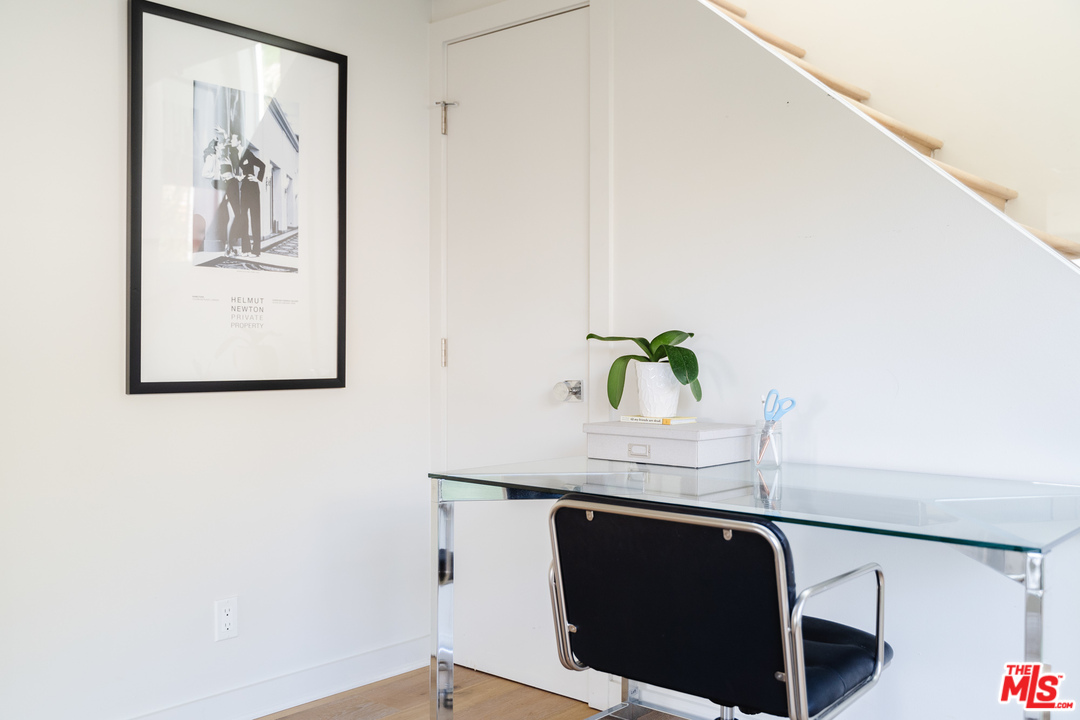 9318 Warbler Way Los Angeles, CA 90069 - Photo 24 of 46 a dining room with table and chair