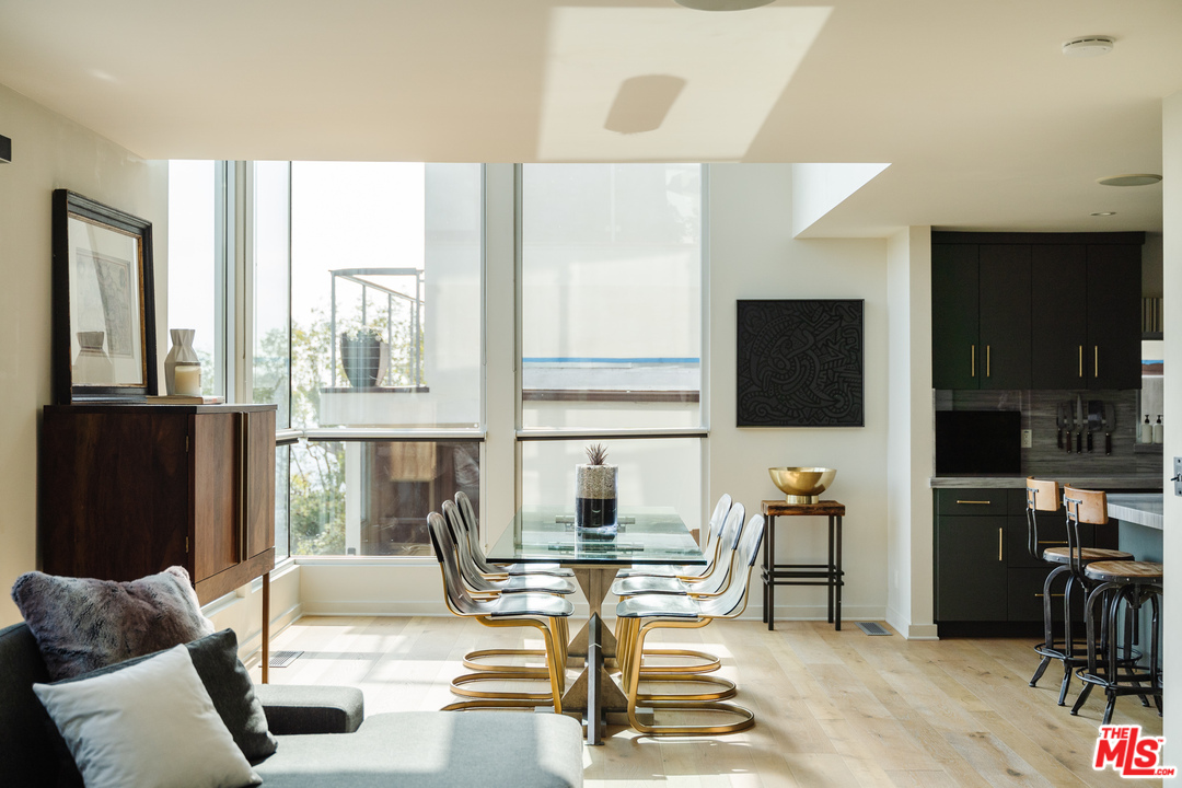 9318 Warbler Way Los Angeles, CA 90069 - Photo 4 of 46 a living room with furniture and a flat screen tv