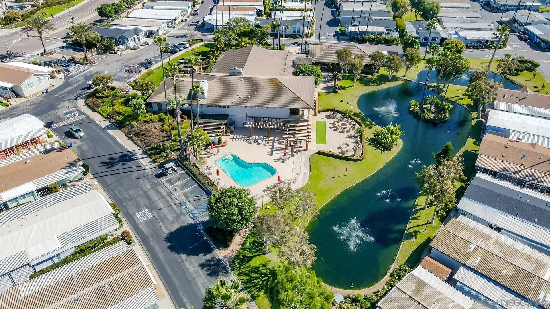 7132 Santa Rosa Carlsbad, CA 92011 - Photo 29 of 54 an aerial view of a house with a yard and lake view