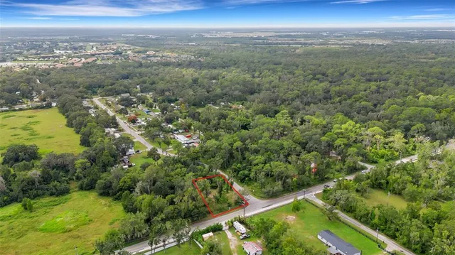 an aerial view of residential building and lake view