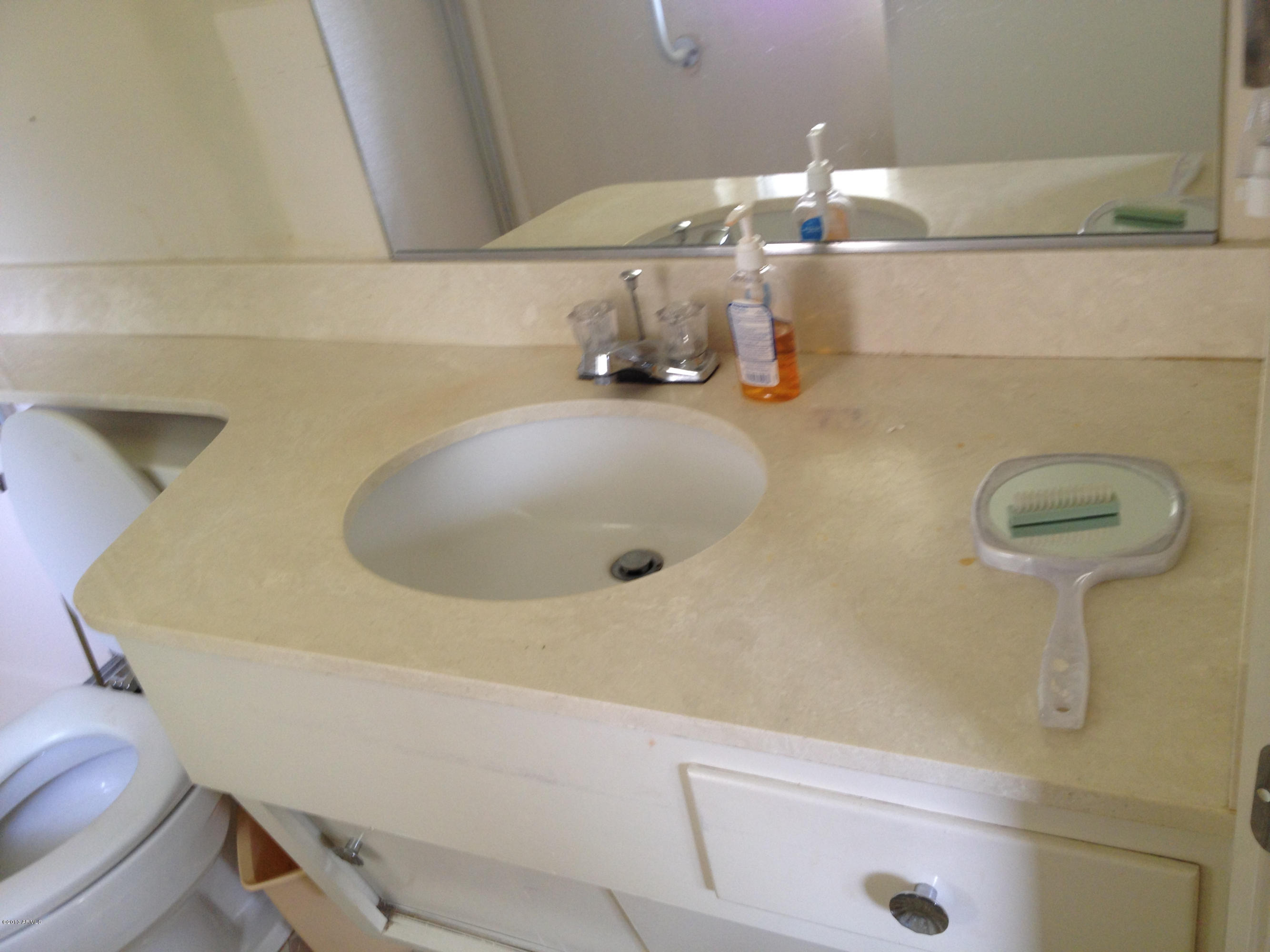 10745 West Hatcher Road Sun City, AZ 85351 - Photo 12 of 15 Master Bath Vanity