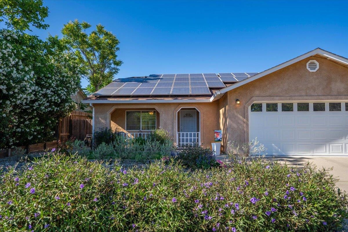 2110 Gentry Way Red Bluff, CA 96080 - Photo 4 of 47 a front view of a house with a yard