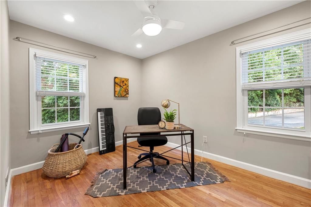 542 Goldsboro Road Northeast, Unit D Atlanta, GA 30307 - Photo 16 of 26 a work room with furniture and a window
