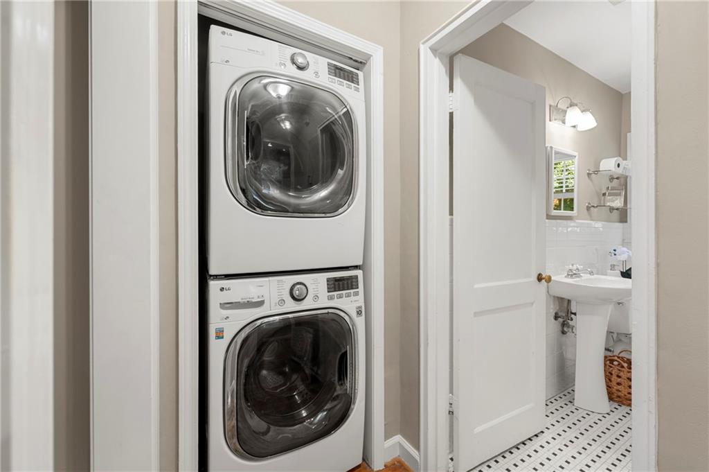 542 Goldsboro Road Northeast, Unit D Atlanta, GA 30307 - Photo 19 of 26 a view of a hallway with washer and dryer