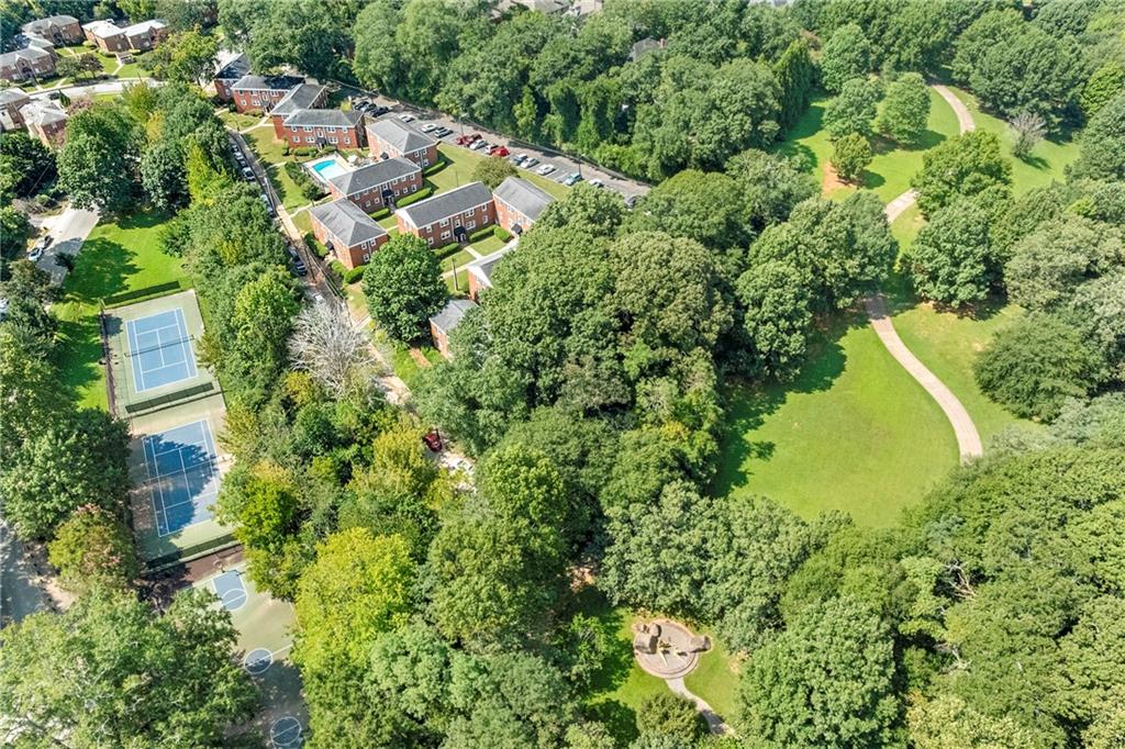 542 Goldsboro Road Northeast, Unit D Atlanta, GA 30307 - Photo 26 of 26 an aerial view of residential house with outdoor space and trees all around