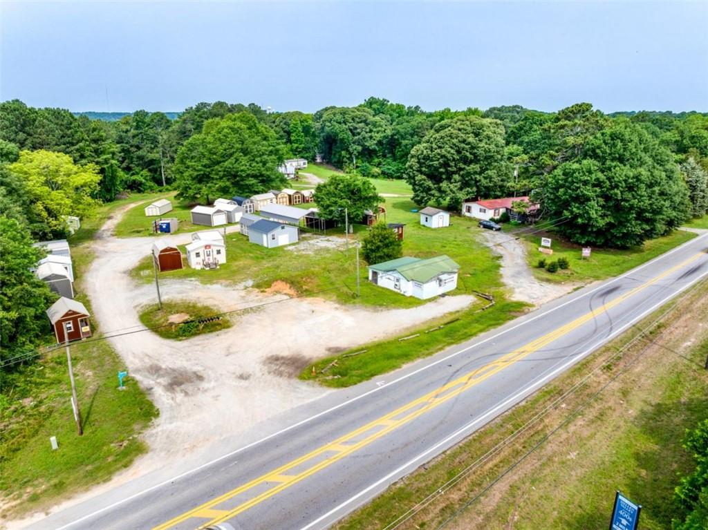 17 Lk Pk Drive Braselton, GA 30517 - Photo 1 of 6 a view of a garden with a lake view