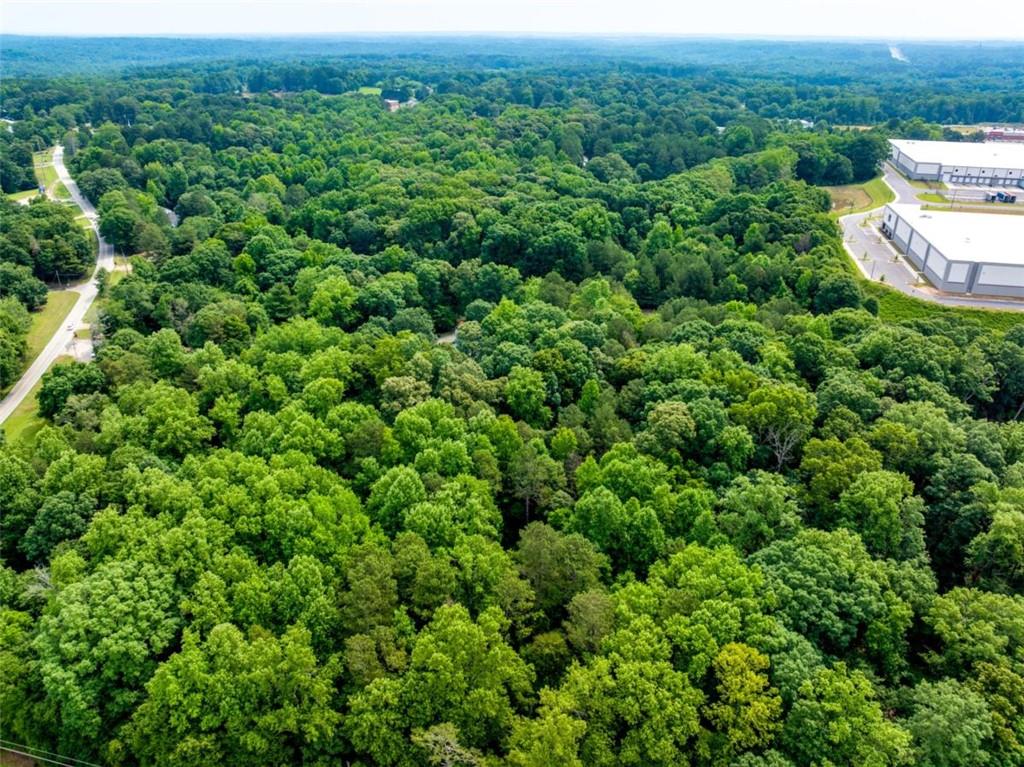 17 Lk Pk Drive Braselton, GA 30517 - Photo 4 of 6 an aerial view of a house with yard and outdoor seating