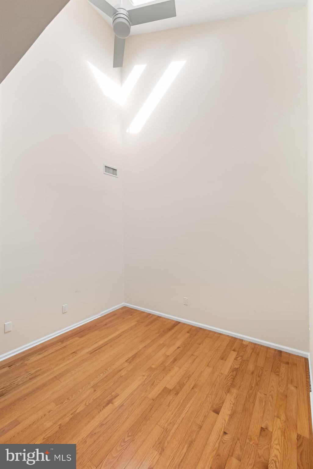 962 Chanticleer Cherry Hill, NJ 08003 - Photo 22 of 38 a view of empty room with wooden floor